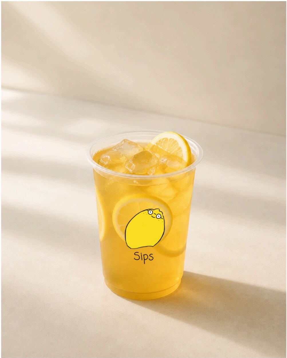 Sips signature cup with lemon mascot